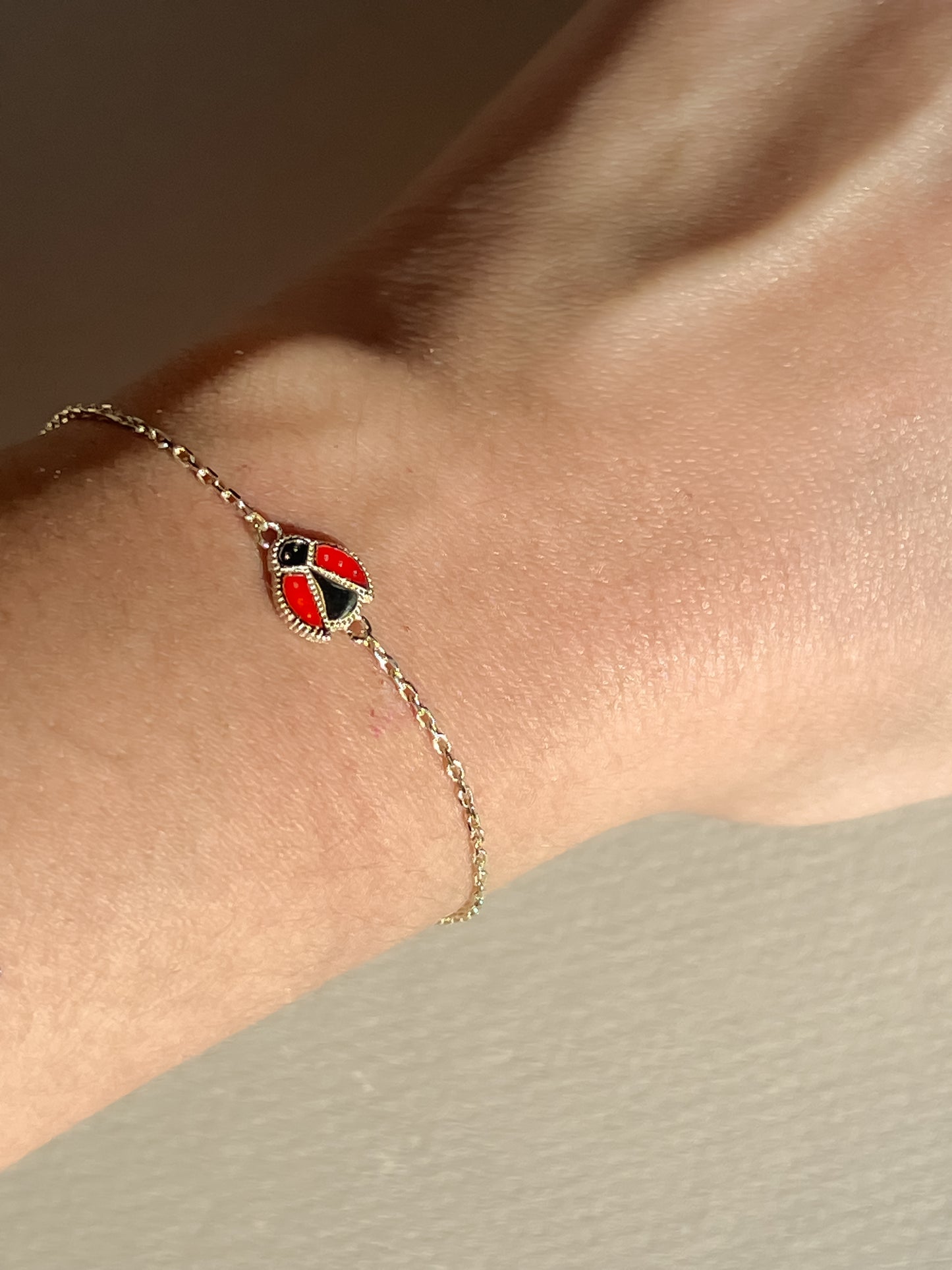 Dainty 10k gold ladybug bracelet