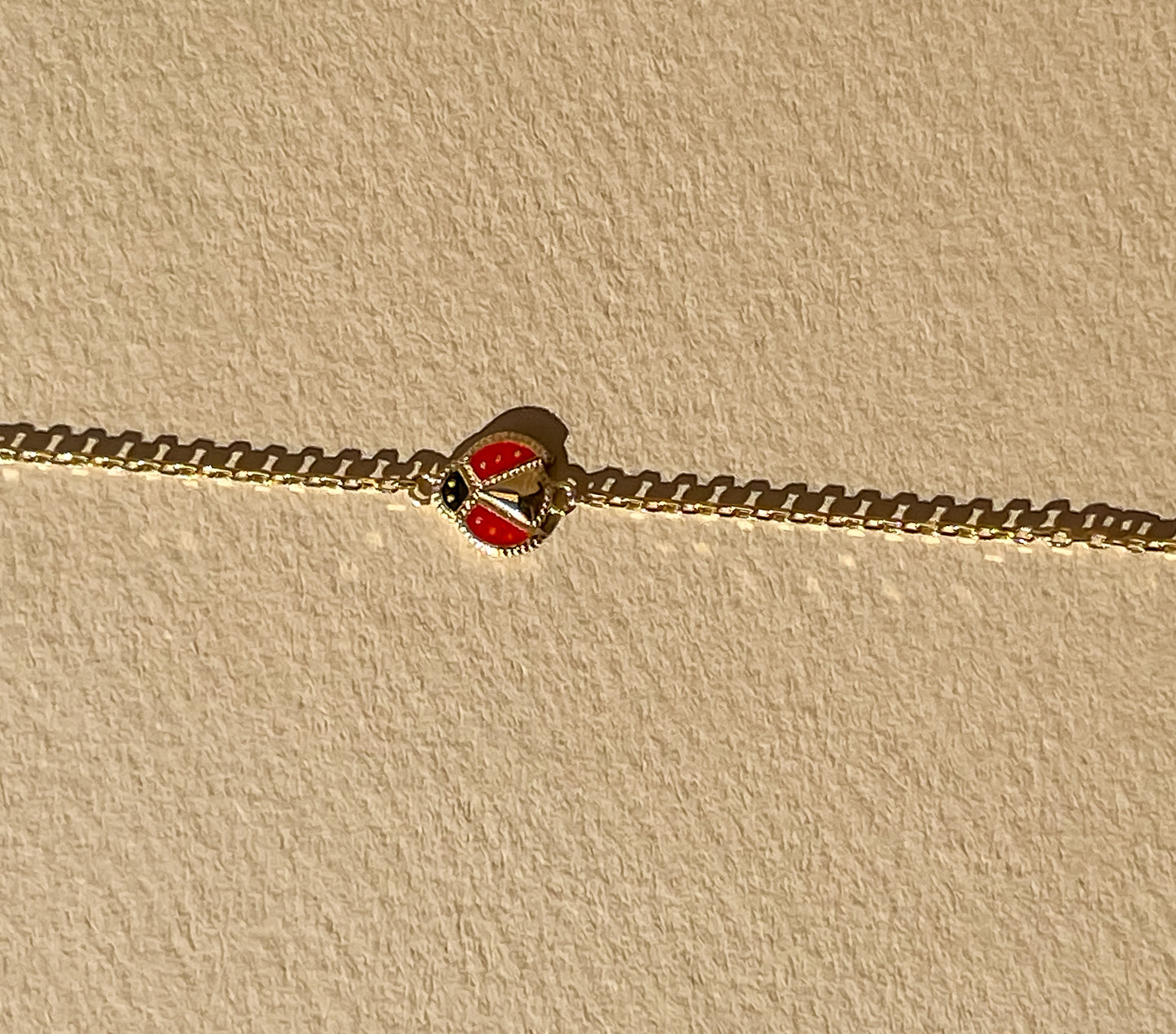 Dainty 10k gold ladybug bracelet